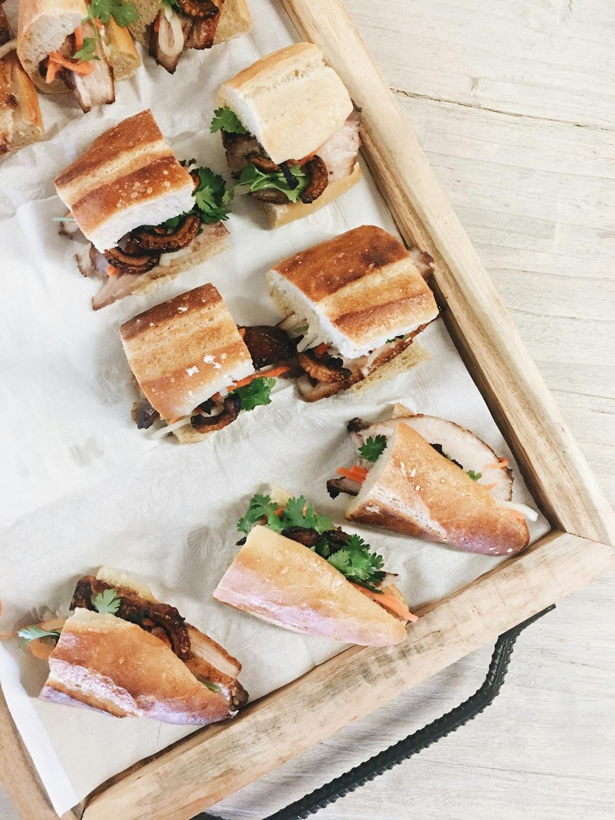 Filled baguettes laid out on a tray